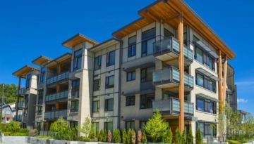 Brand new apartment building on sunny day